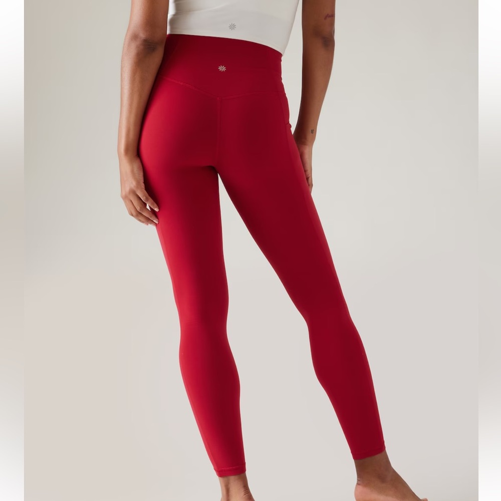 ATHLETA SALUTATION STASH TIGHT - M - Picture 2 of 7